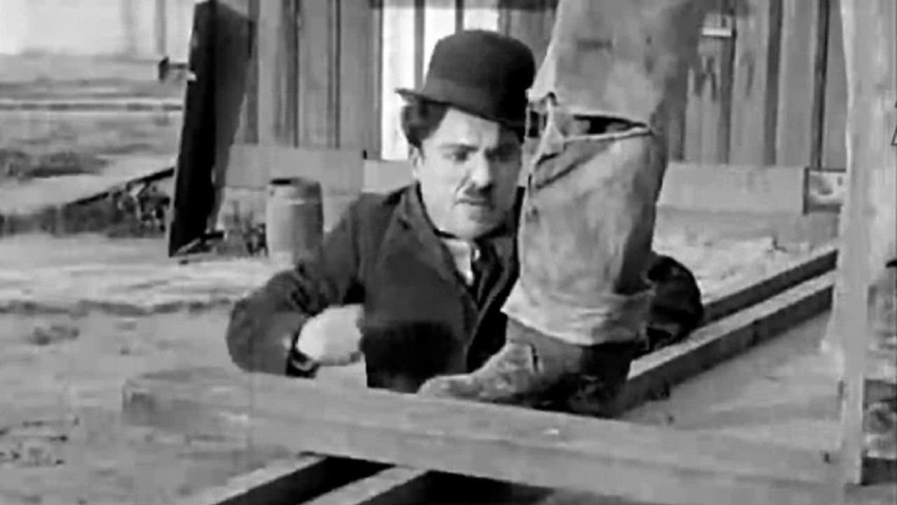 Charlot et le parapluie